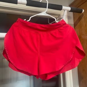 red lululemon fast and free / find your pace shorts
